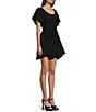 Color:Black - Image 3 - Puff Short Sleeve Waist Tie Flowy Dress