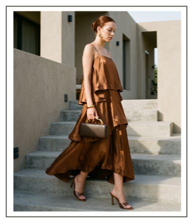 grey wrap dress Queen Parsley Color:Mirrorball (Pictured) around 43.5 / 110 collection: essentials Texas Standard - Sizing