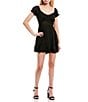 Color:Black - Image 1 - Short Sleeve Peasant Two Tiered Fit-And-Flare Mini Dress