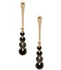 Anne Klein Gold Tone Rounded CZ Linear Earrings - Image 1