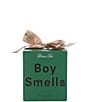 Boy Smells Xmas Tree Candle - Image 2