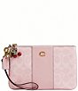 COACH Boxed Essential Small Signature Canvas Cherry Charm Wristlet - Image 1