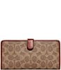 COACH Coated Signature Canvas Skinny Wallet, Color:Tan Rust - Image 1