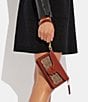 Color:Tan Rust - Image 6 - Tabby Wristlet Signature Coated Canvas Convertible Wristlet Crossbody Bag