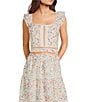 Evolutionary Floral Printed Eyelet Ruffle Short Sleeve Coordinating Top - Image 1