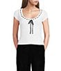 Evolutionary Sweater Knit Scoop Neck Cap Sleeve Tie Front Top - Image 1