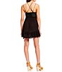 Color:Black - Image 2 - Adella Lace Slip Ruffle Tiered Asymmetrical Hem V-Neck Sleeveless Strappy Back Detail Flounce Mini Dress
