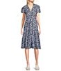 Color:Blooms Navy - Image 1 - Libby Blooms Navy Print Jude Cloth Knit V-Neck Short Puff Sleeve A-Line Tiered Midi Dress