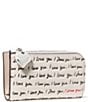kate spade new york Devin Small 'I Love You' Embossed Script Slim Bifold Wallet, Color:Cream Multi - Image 4