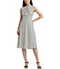 Color:Winter Cream - Image 1 - Dotted Georgette Tie Neck Sleeveless A-Line Midi Dress