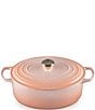 Color:Peche - Image 1 - Signature 6.75-Quart Oval Dutch Oven with Light Gold Knob- Peche