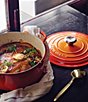 Le Creuset Signature 4.5-Quart Round Enameled Cast Iron Dutch Oven, Color:Flame - Image 4