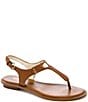 Color:Luggage - Image 1 - MICHAEL Michael Kors Leather MK Plate Thong Sandals