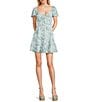 Midnight Doll Floral Short Sleeve Smocked Back Tiered Woven Mini Dress - Image 1