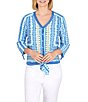 Color:Pacific Multi - Image 1 - Petite Size Pacific Ikat Print V-Neck 3/4 Roll-Tab Sleeve Tie Hem Button Front Woven Top