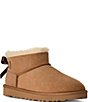 UGG Women's Ultra Mini Bailey Bow Suede Shearling Lined Booties - Image 1