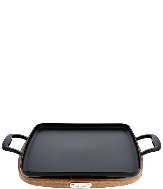 https://dimg.dillards.com/is/image/DillardsZoom/mainProduct/all-clad-enameled-cast-iron-griddle-with-acacia-wood-trivet-11-inch/00000000_zi_20417884.jpg