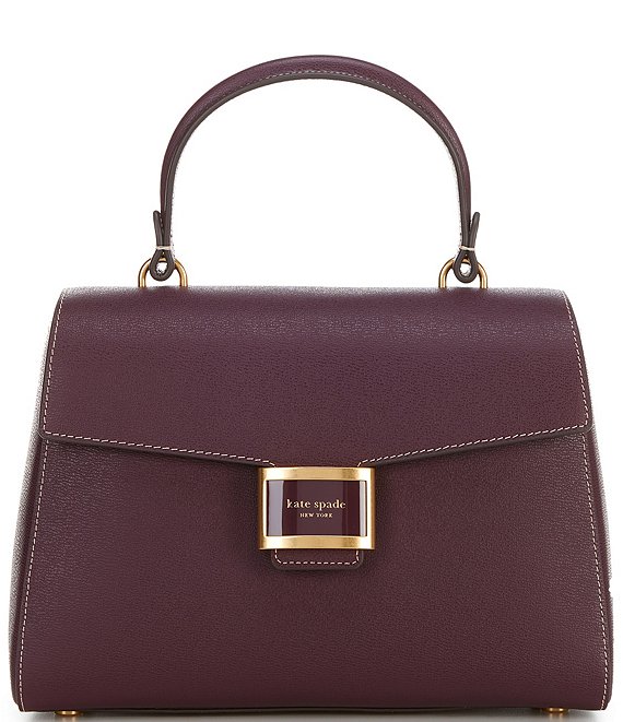 https://dimg.dillards.com/is/image/DillardsZoom/mainProduct/kate-spade-new-york-katy-medium-top-handle-textured-satchel-bag/00000000_zi_fd7f65e8-65bd-48e9-ab08-76aa9cafe5eb.jpg