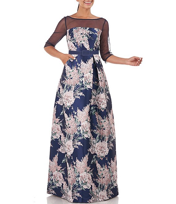 https://dimg.dillards.com/is/image/DillardsZoom/mainProduct/kay-unger-floral-print-illusion-boat-neck-34-sleeve-jacquard-ball-gown/00000000_zi_1d39205e-ed3c-4360-8abf-a495e242cea6.jpg
