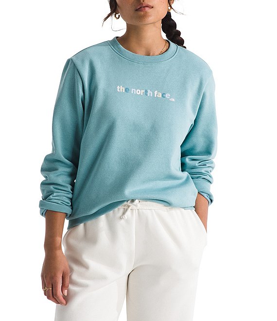 The North Face Evolution Proud Crew Neck Long Sleeves Graphic Pullover, Blue Eclipse - Image 1