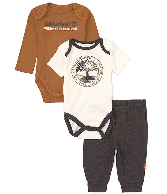 https://dimg.dillards.com/is/image/DillardsZoom/mainProduct/timberland-baby-boys-newborn-6-months-long-sleeve-logo-bodysuit-short-sleeve-graphic-tee--solid-jogger-pants-set/00000000_zi_703298b9-e04d-49e2-930f-bbea45dea2e4.jpg