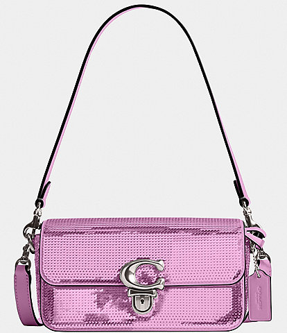 Dillards has the pink and purple Coach Luna bags on clearance for