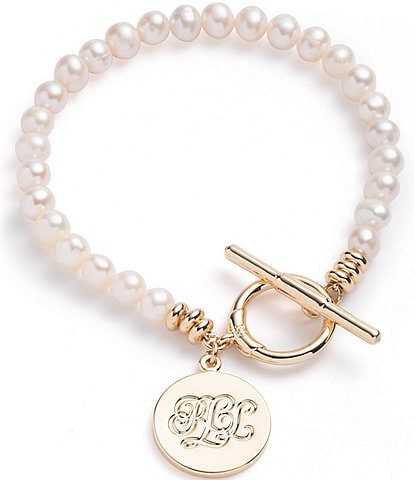 Lauren Ralph Lauren Gold Tone White Freshwater Pearl Logo Flex Line Bracelet