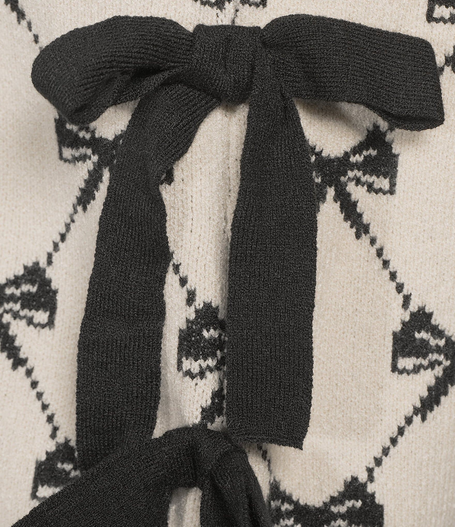 Blu Pepper Bow Pattern Knit Short Sleeve Tie Side Sweater