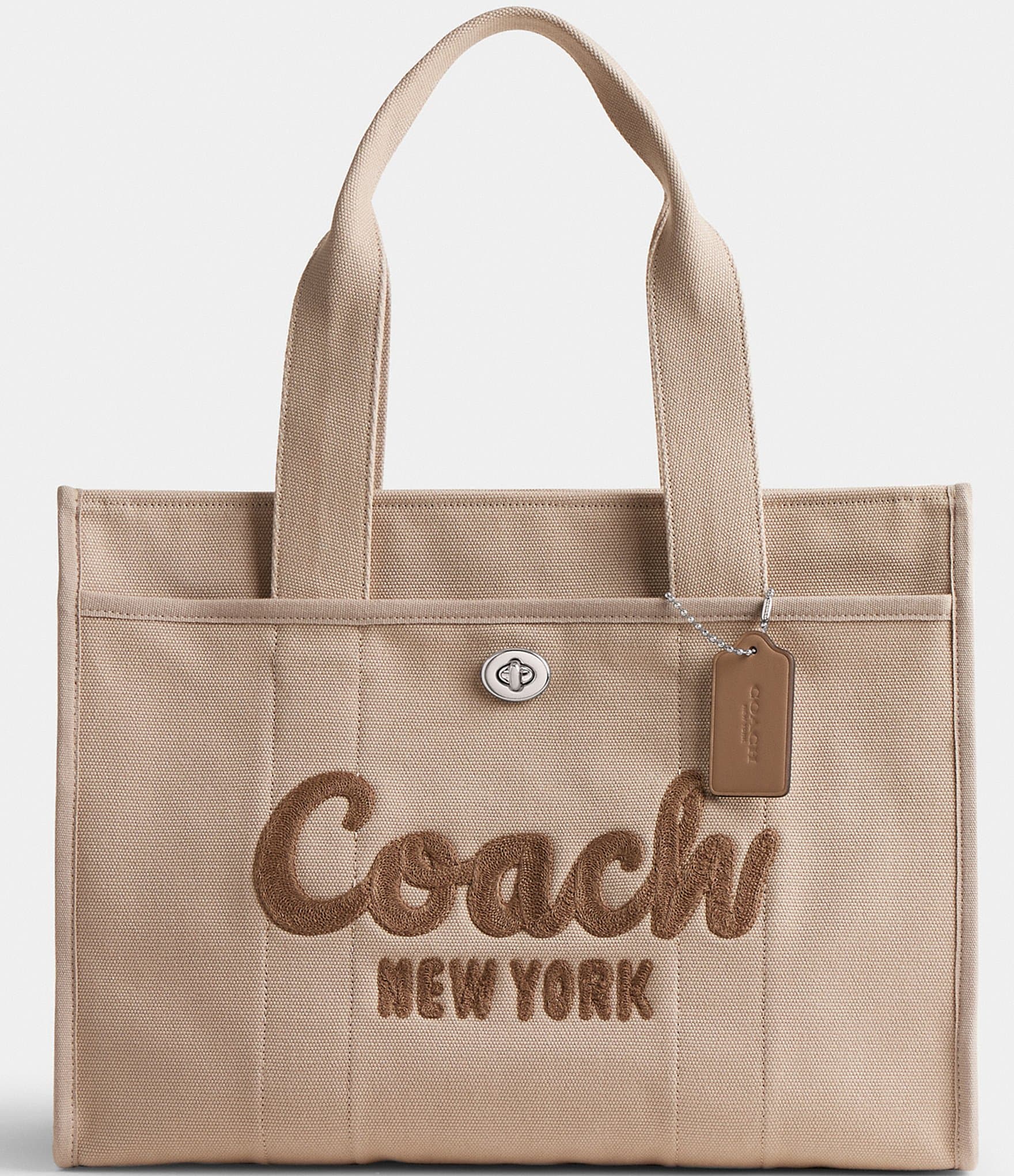 Coach Town Tote in Signature Canvas | Leather handbags tote, Tan tote bag,  Nylon tote bags