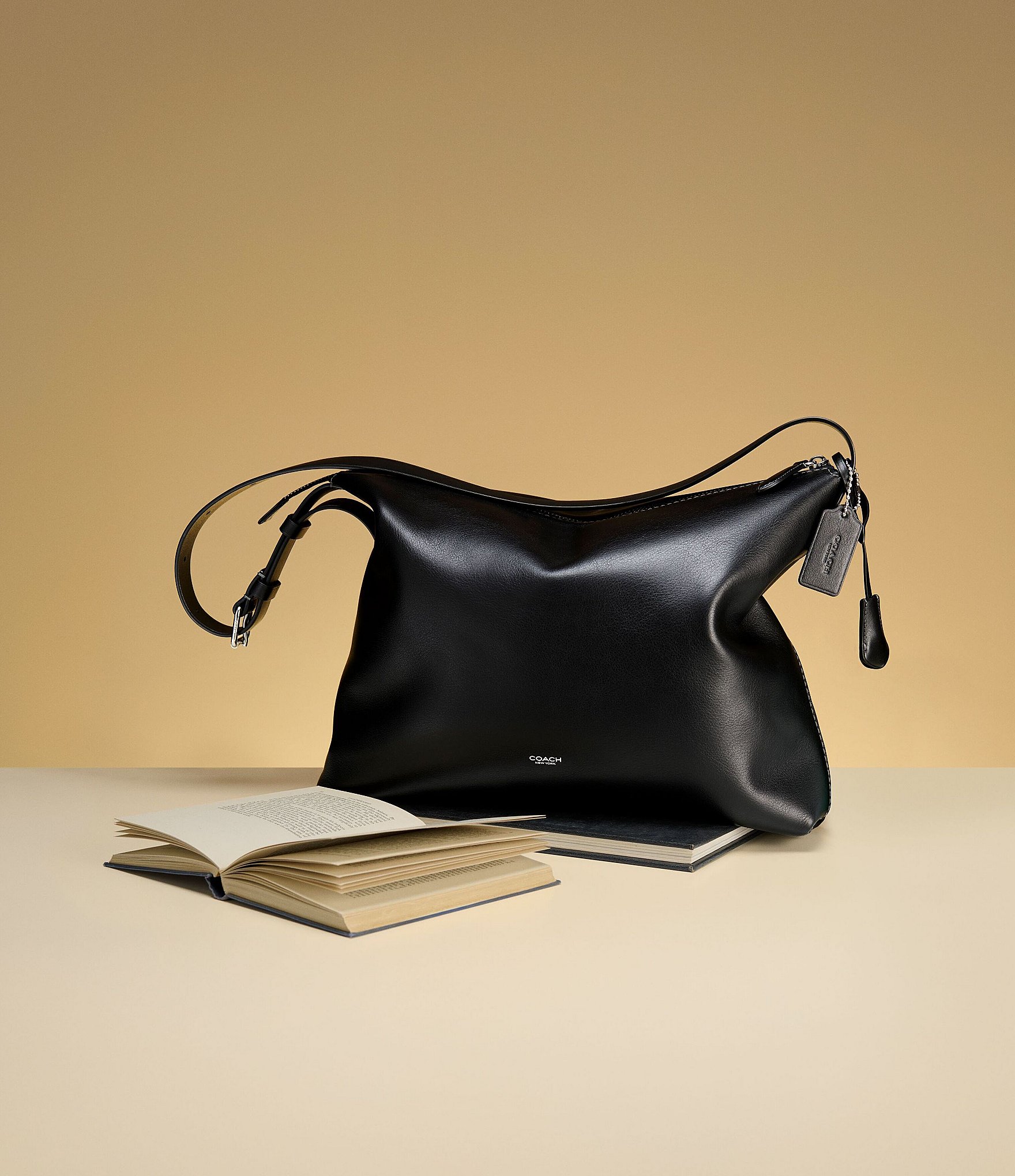 COACH Mott Loved Leather Messenger Bag