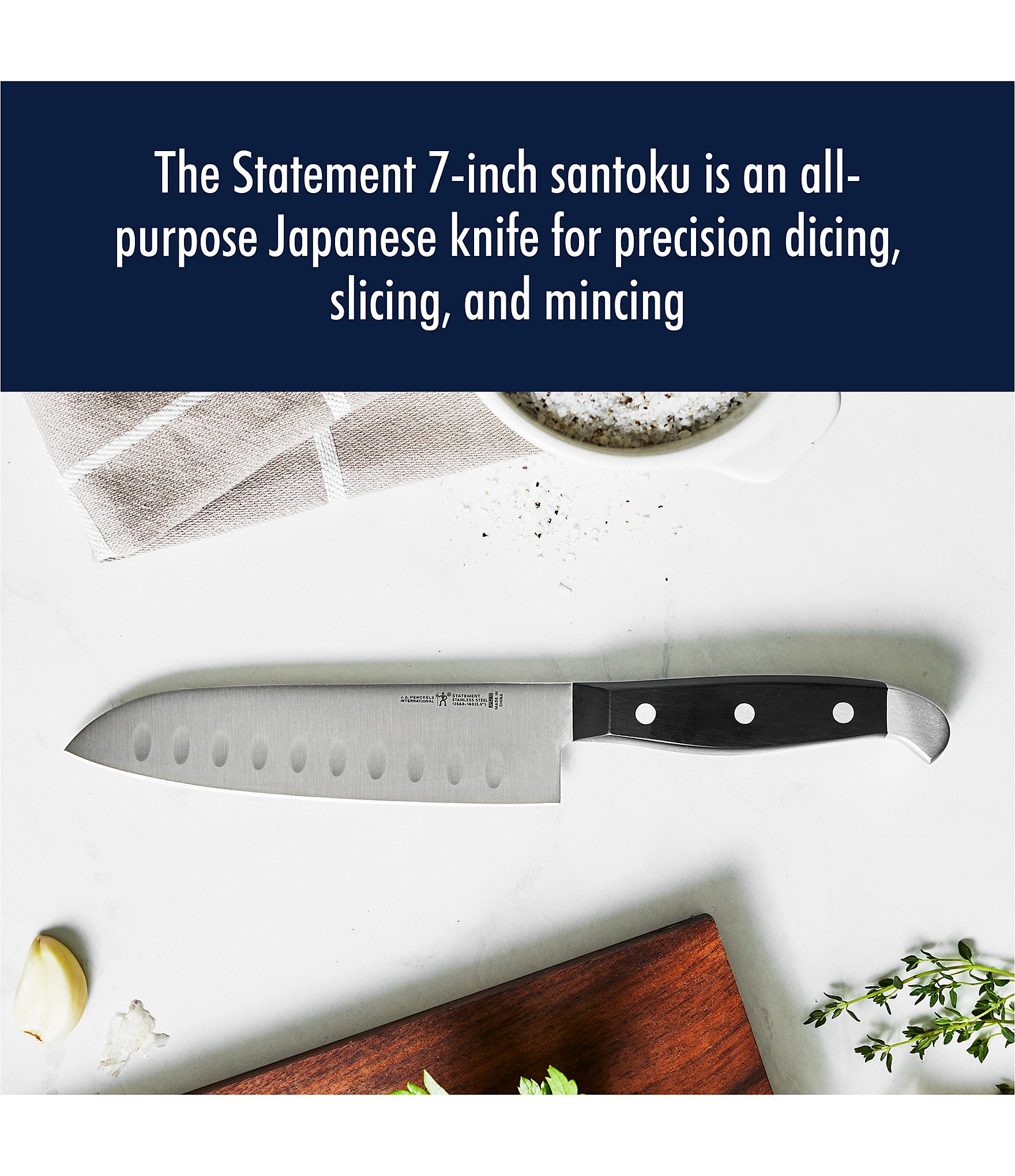 Henckels Statement 7-inch Hollow Edge Santoku Knife