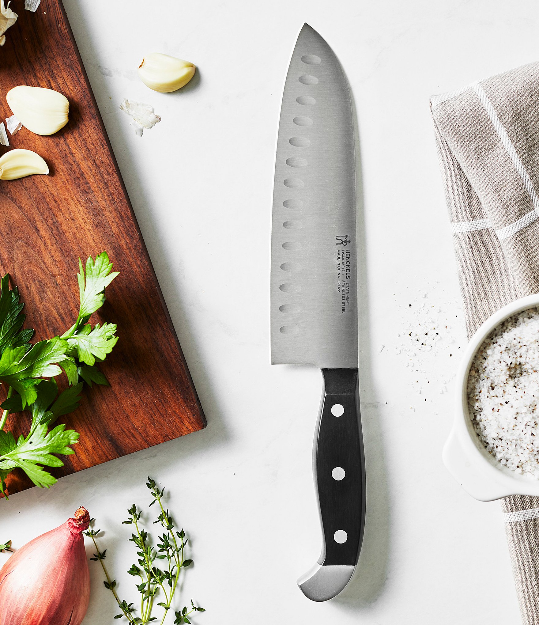 Henckels Statement 7-inch Hollow Edge Santoku Knife