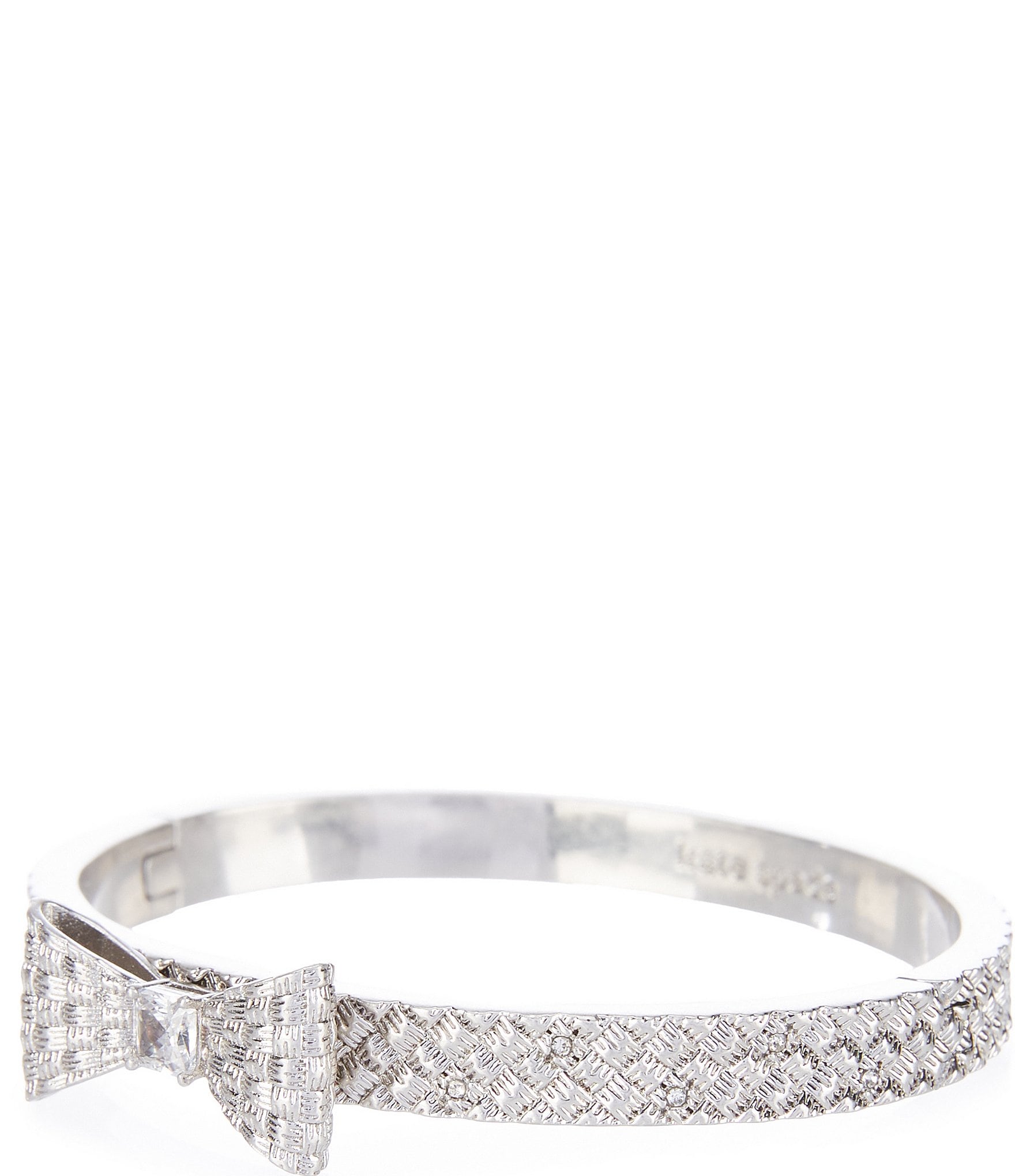 Buy the Designer Henri Bendel Silver-Tone Crystal Bow Hinged Bangle Bracelet  | GoodwillFinds