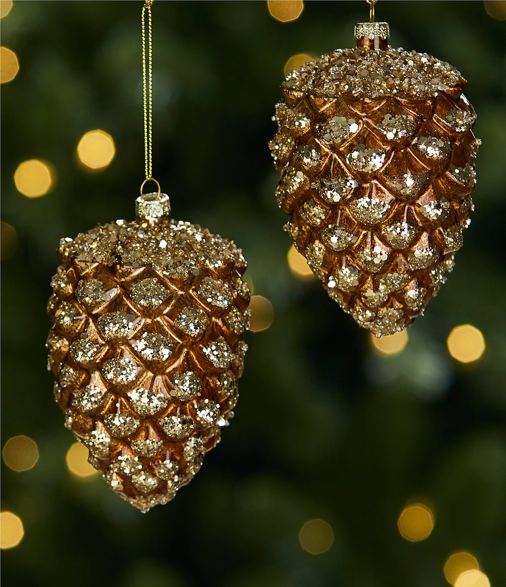 https://dimg.dillards.com/is/image/DillardsZoom/zoom/southern-living-forest-fantasy-collection-gold-glittered-glass-pinecone-ornament-2-piece-set/00000000_zi_20386703.jpg