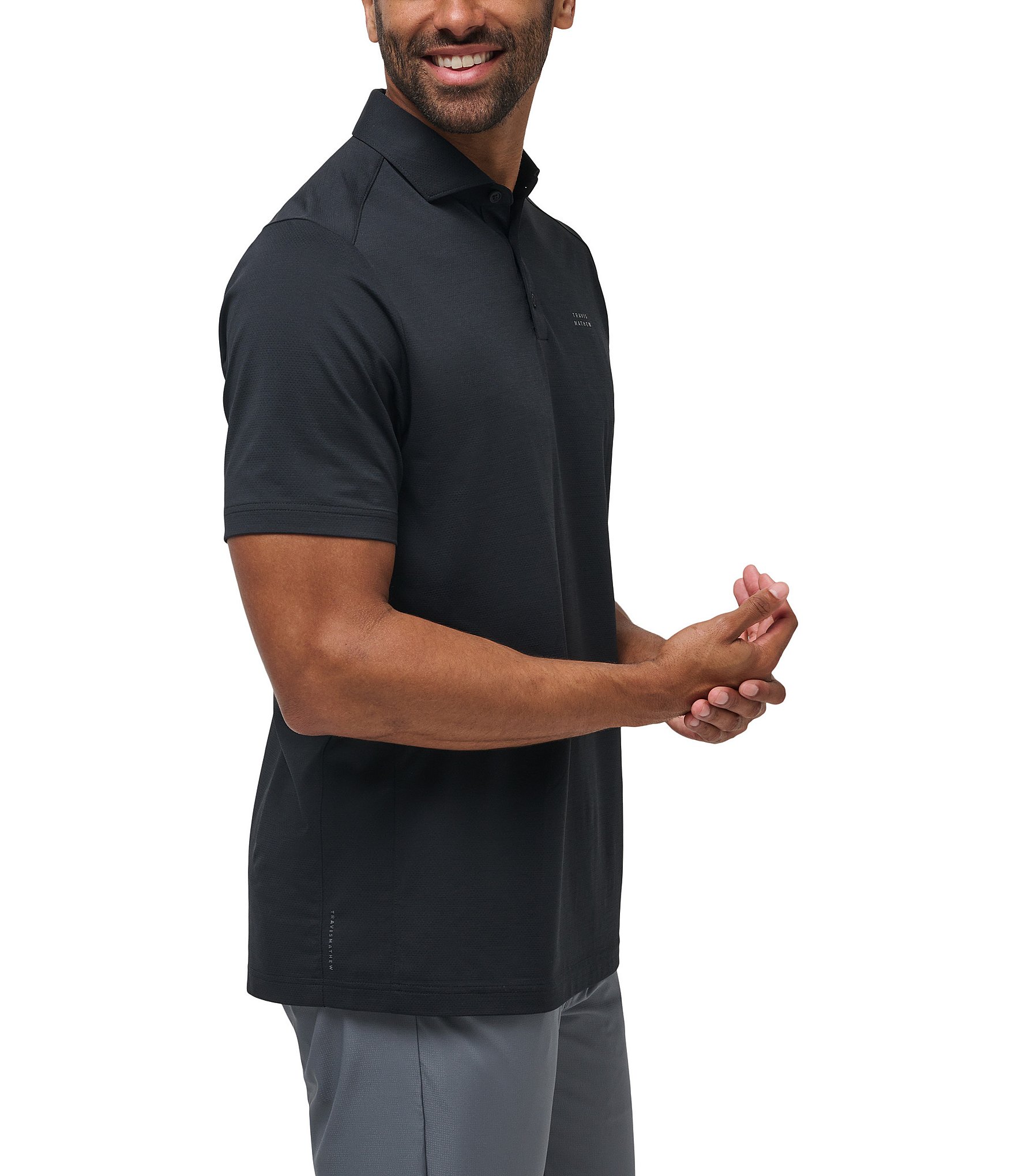 TravisMathew Performance Stretch The Heater Pro Short Sleeve Polo Shirt