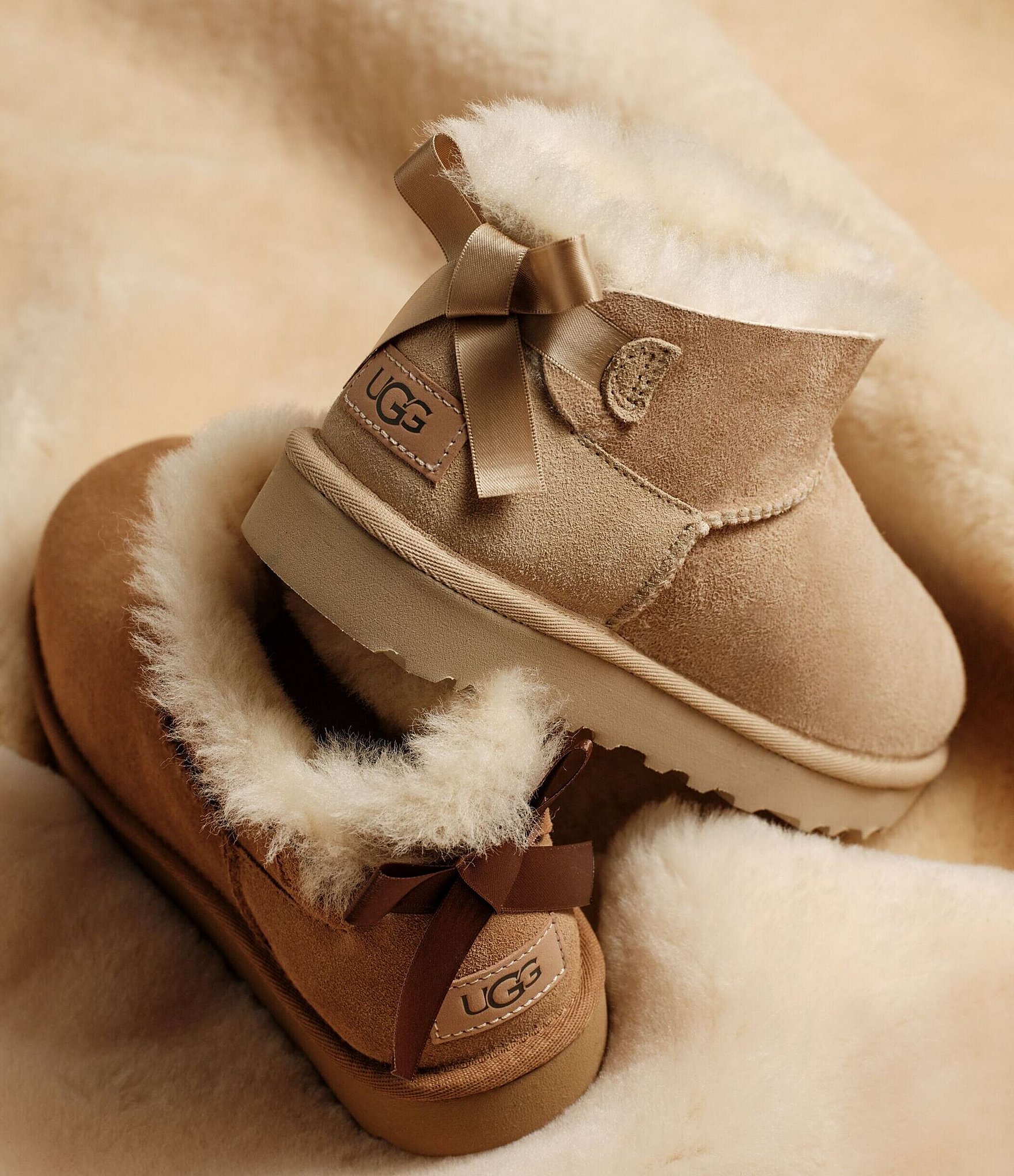 UGG Women's Ultra Mini Bailey Bow Suede Shearling Lined Booties