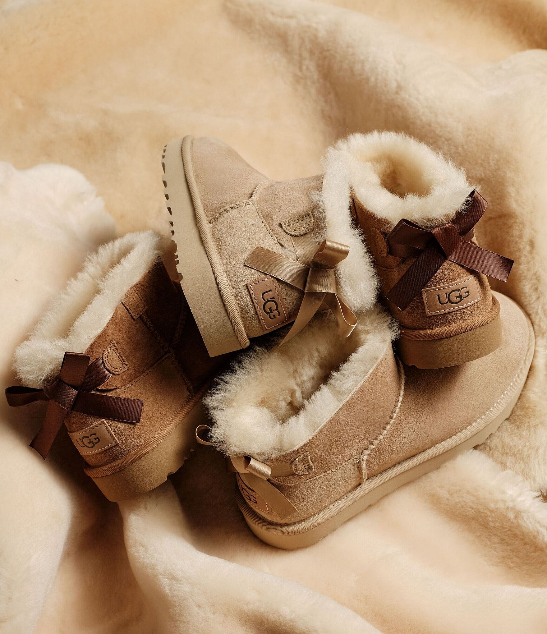 UGG Women's Ultra Mini Bailey Bow Suede Shearling Lined Booties